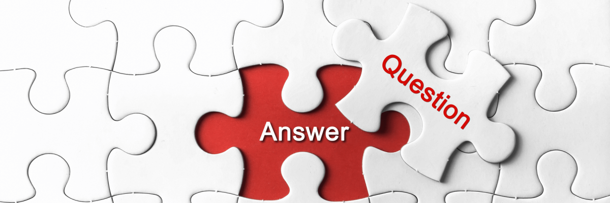 White puzzle with piece that reads question pulled away to reveal red underneath that says answer