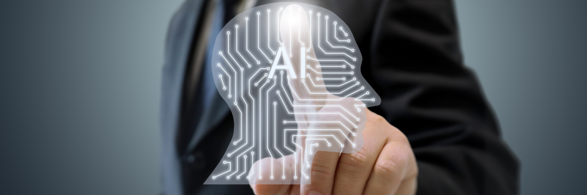 hand touching screen that says AI