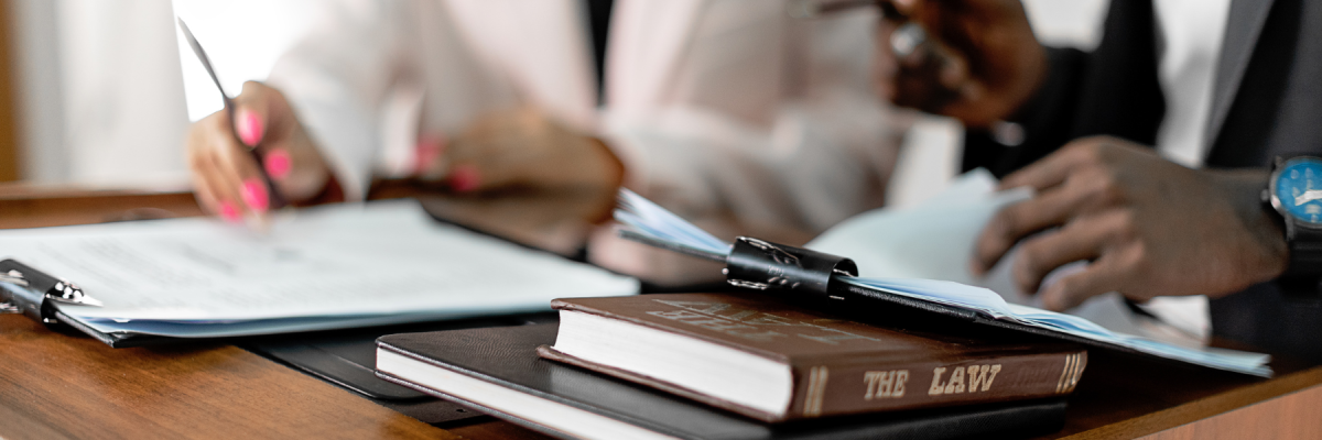 lawyers with books and documents